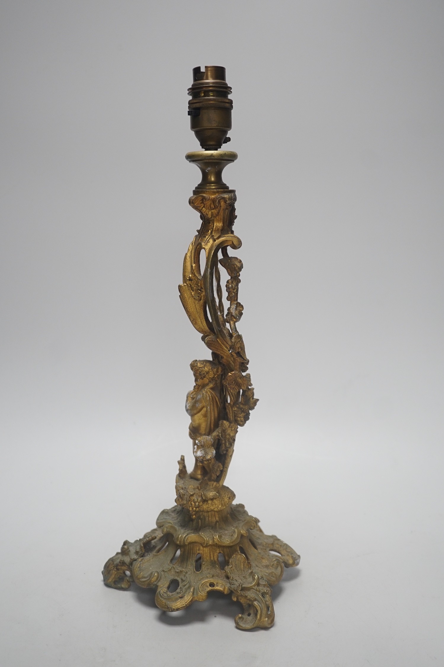 A 19th century French rococo style ormolu candlestick, converted to table lamp, 39cm tall